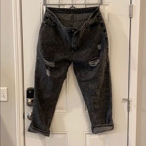 Distressed dark jeans